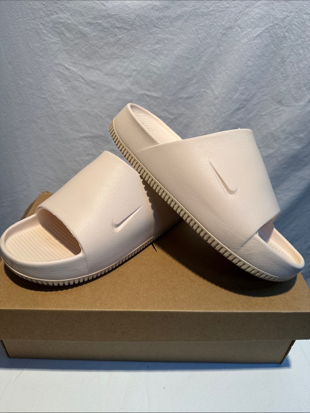 Nike Women's Light Pink Slide Sandals